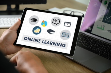 Wall Mural - online learning website on tablet computer