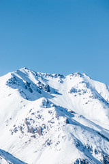 Wall Mural - mountains in winter, snow capped peaks, mountain winter landscape