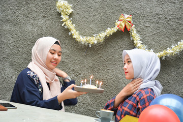 Portrait of two hijab woman bestfriend having time together in celebrate event