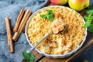 Wall Mural - Apple crumble with cinnamon for breakfast.