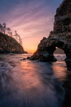 Trinidad State Beach, California At Sunset With Rock Arch