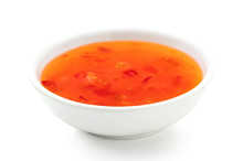 Sweet Chilli Sauce In A White Ceramic Bowl Isolated On White.