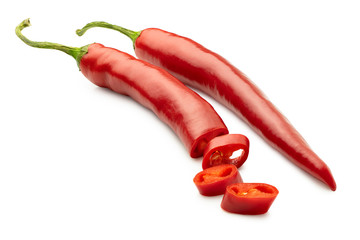 Wall Mural - One whole and one cut red chilli isolated on white.