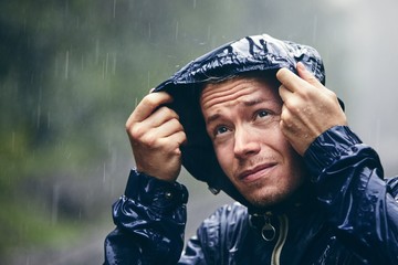 Traveler in heavy rain