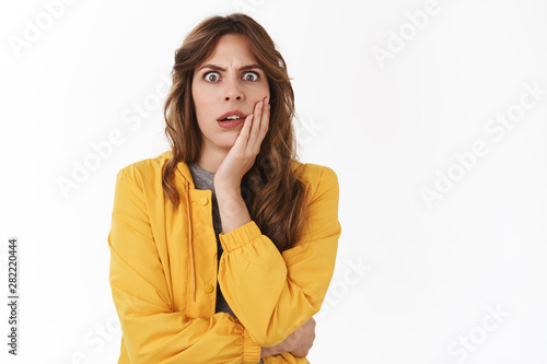 Wtf Going On Confused Girl Cringe Face Look Shocked Puzzled Touch Cheek Stare Awkward Stunned Reacting Disturbed Awful Disgusting Scene Standing White Background Speechless Disappointed Stock Photo Adobe Stock