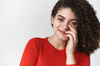 © Cookie Studio - Beauty, tenderness emotions concept. Attractive stylish sassy young curly-haired hispanic girl sick eyebrows curly dark hair cover smile palm grinning happily flirting look coquettish camera