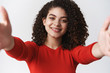 © Cookie Studio - Close-up tender caring lovely young dark-haired girl curly hairstyle stretch hands camera taking selfie making self photograph grinning cute silly post personal blog online, white background