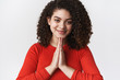 © Cookie Studio - Close-up tender feminine beautiful young girl dark curly hairstyle press hands together pray namaste gesture look thankful bowing polite ask please hopeful supplicating, smiling cheerful relaxed