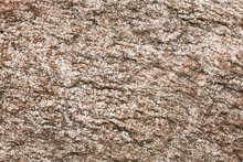 Gray Rock Mineral Background. Red Cracked Stone Closeup Macro Texture. Natural Geology Pattern.