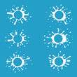 © Віталій Баріда - Abstract milk splashes isolated on the blue background