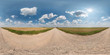 full seamless spherical hdri panorama 360 degrees angle view on gravel road among fields in summer day with awesome clouds in equirectangular projection, ready for VR AR virtual reality content