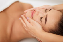 Woman Getting Face Massage At Beauty Salon, Closeup