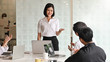 © Prathankarnpap - Young passionate businesswoman explaining her idea in the meeting room