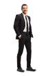 © Ljupco Smokovski - Young man in a black suit posing