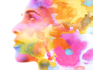 Paintography. Double exposure. Close up of an attractive model combined with colorful hand drawn ink and watercolor painting with overlapping brushstroke texture