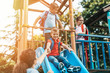 © hedgehog94 - School children playing on the slide.