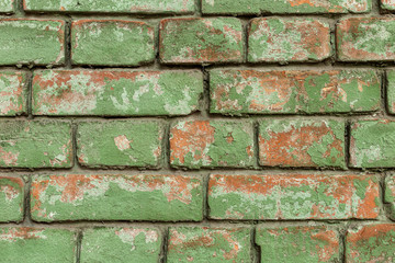 Old green brick wall, rustic texture, design background.