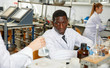 © JackF - Experienced female scientist writing report after chemical experiment