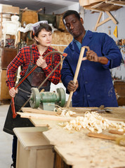 Artisans in process of renewing armchair