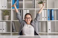 Cheerful Woman After Working Day In Office