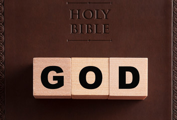 Wall Mural - God Spelled in Blocks on a Leather Holy Bible