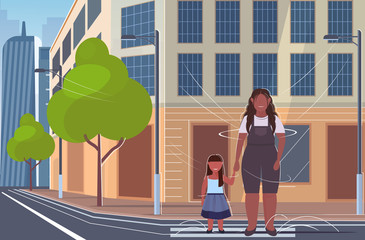 Wall Mural - fat overweight woman with little child standing on crosswalk obese african american mother and daughter walking outdoor city street cityscape background full length flat horizontal