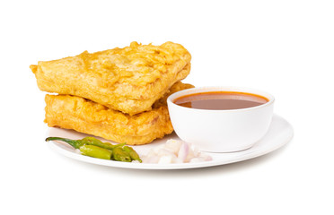 Indian Fried Snack Bread Pakora. It is also known as bread bhaji. A common street food, it is made from bread slices, gram flour, and spices among other ingredients