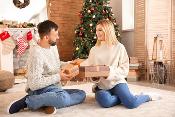 Poster - Happy couple greeting each other on Christmas eve