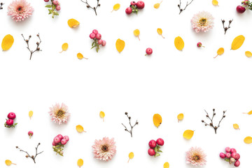 Wall Mural - Autumn Background With Pink Flowers, Berries And Yellow Leaves