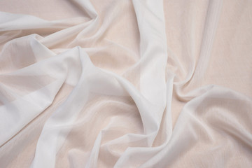 Silk fabric texture with white cotton. Marquette. Background, pattern.