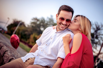 Happy young couple having fun outdoors