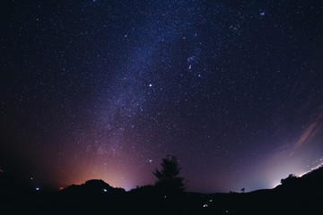 Wall Mural - landscape night sky stars milky way on mountains background