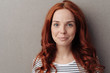 © contrastwerkstatt - Pretty young woman with long curly red hair