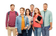 © Syda Productions - education, high school and people concept - group of smiling students with books over white background