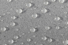 Background Design Made Of Water Drops On A Gray Background