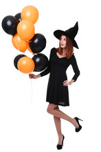 Beautiful Redhaired Woman In Halloween Costume With Balloons On White Background