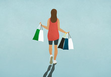 Woman Carrying Shopping Bags