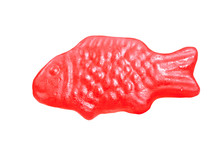 Isolated Red Fish-shaped Jelly. Jellyfisk With Strawberry Flavor. Typical Norwegian And Swedish Sweets Called Jordbærfisker.