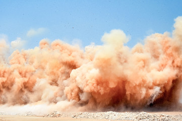 Dust smoke and debris after the detonator blast 