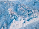 Fototapeta Tęcza - Icebergs drone aerial image top view - Climate Change and Global Warming. Icebergs from melting glacier in icefjord in Ilulissat, Greenland. Arctic nature ice landscape in Unesco World Heritage Site.