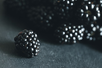 Wall Mural - Fresh blackberry on a black background