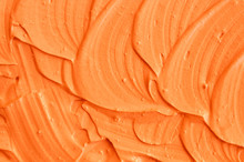Orange Facial Mask (pumpkin Cream, Body Scrub) Texture Close Up. Abstract Background With Brush Strokes.