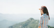 © Alex Photo - Woman looking into the distance in mountains.
