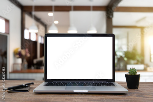 Fotomural Desk Laptop with blank screen on table of coffee