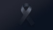 Black ribbon mourning for text on dark background