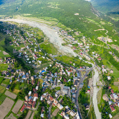 Wall Mural - Panoramic view of Svan Towers in Mestia, Svaneti region, Georgia. It is a highland townlet in the northwest of Georgia, at an elevation of 1500 meters in the Caucasus Mountains.