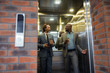 © zinkevych - Businessman having small talk in the elevator in the morning