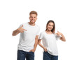 © New Africa - Young couple wearing blank t-shirts isolated on white. Mockup for design