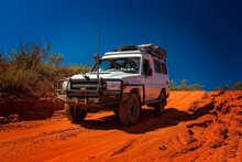 Western Australia – Outback Track With 4WD Car Downhill To The Ocean At Dampier Peninsula