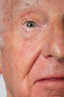 Portrait of a senior caucasian man’s  eye themes of retirement senior aging process portrait